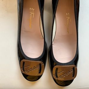 My Ferragamo brown and black heels.